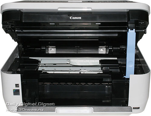 Canon PIXMA MX330. Вид спереди с приподнятым сканером (Доступ к картриджам)