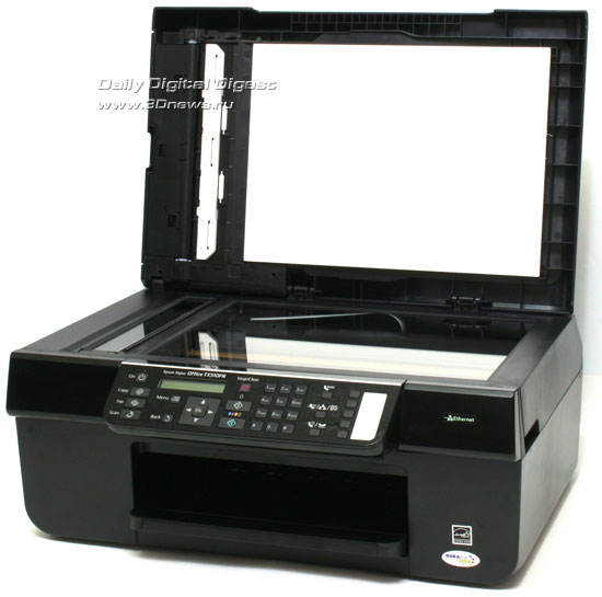 EPSON Stylus Office TX510FN. Вид общий. Крышка модуля сканера
раскрыта на максимальный угол