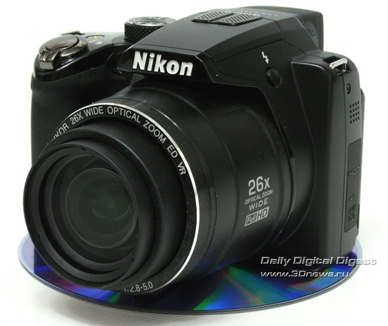 Nikon Coolpix P100. Вид общий. Объектив в крайнем ШУ-положении Nikon Coolpix P100. Вид общий. Объектив в крайнем ШУ-положении