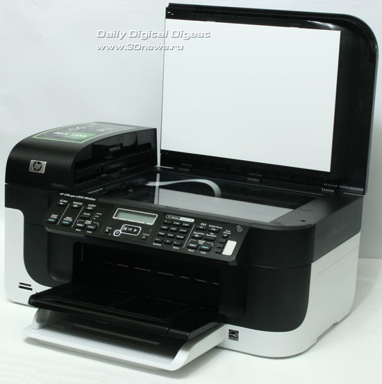  HP Officejet Pro 6500 Wireless E709n. Вид общий. Поднята крышка сканера 