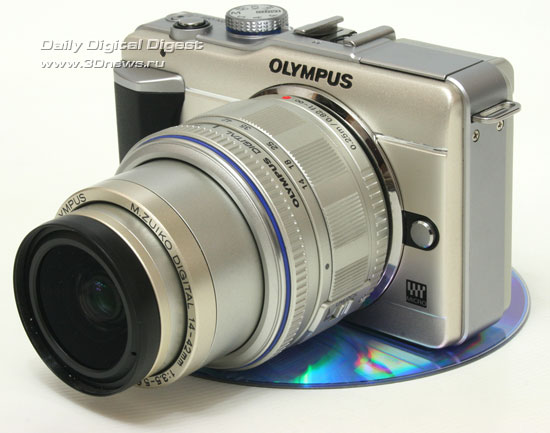  Olympus PEN E-PL1. Вид общий. Объектив в телеположении 